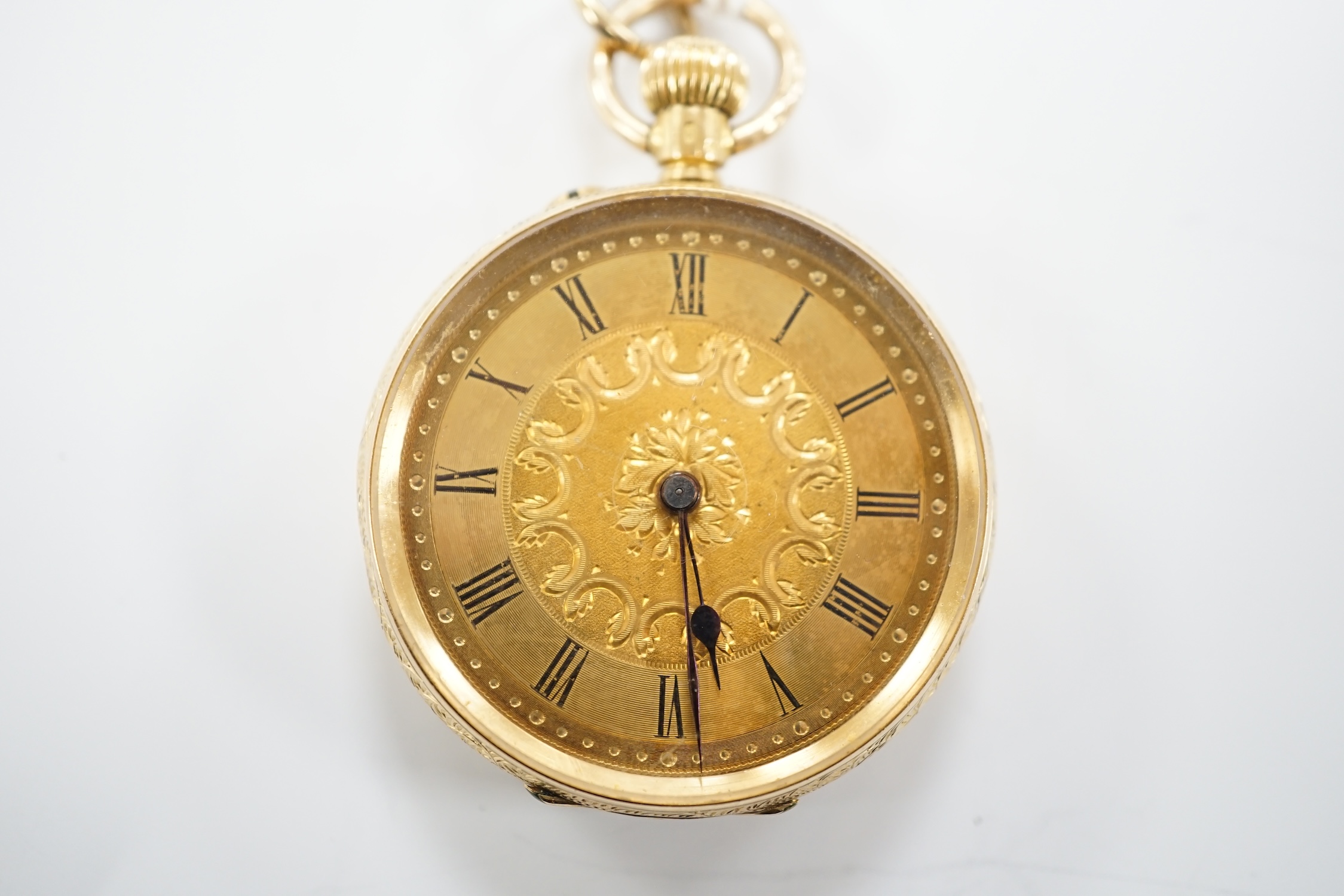 A continental engraved 18k gold open face fob watch, with Roman dial, gross weight 38.5 grams.